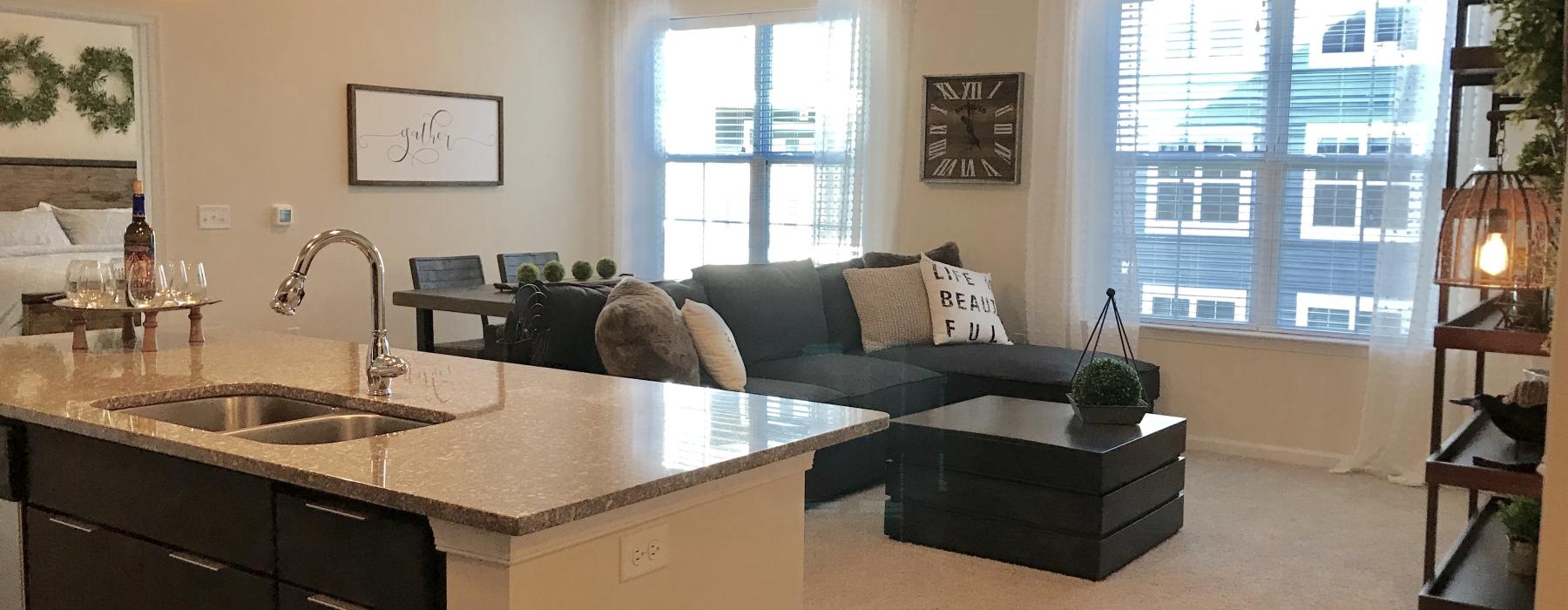 open concept living with a connected kitchen and living room