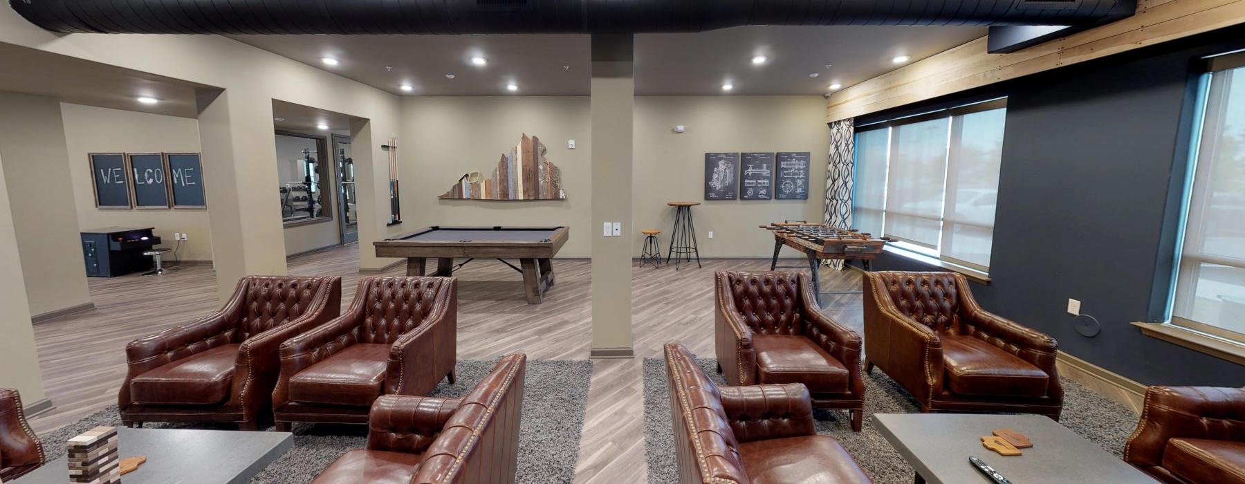 a room with chairs and tables