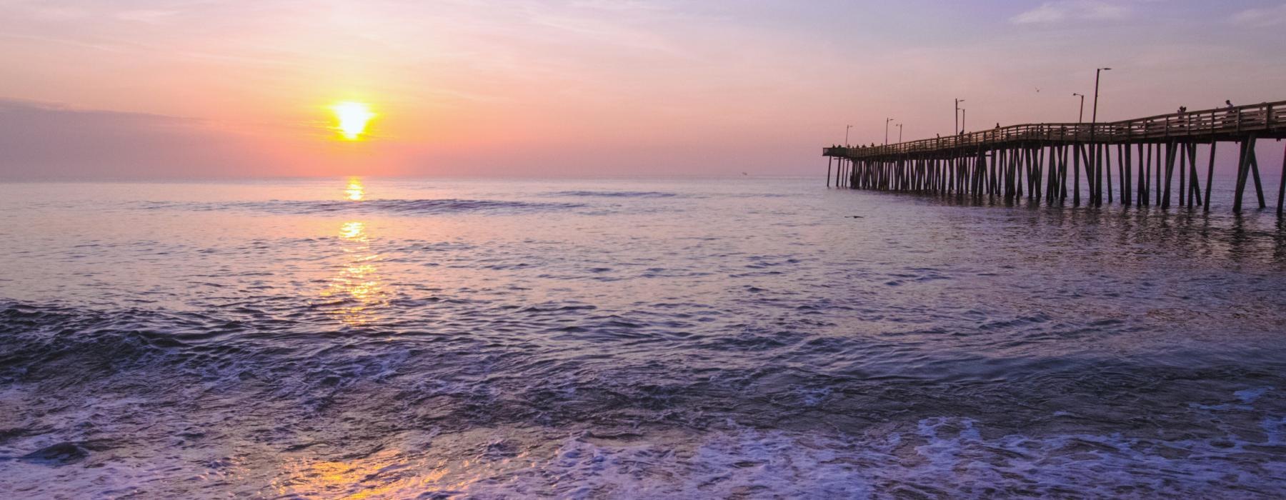 a sunset over a beach