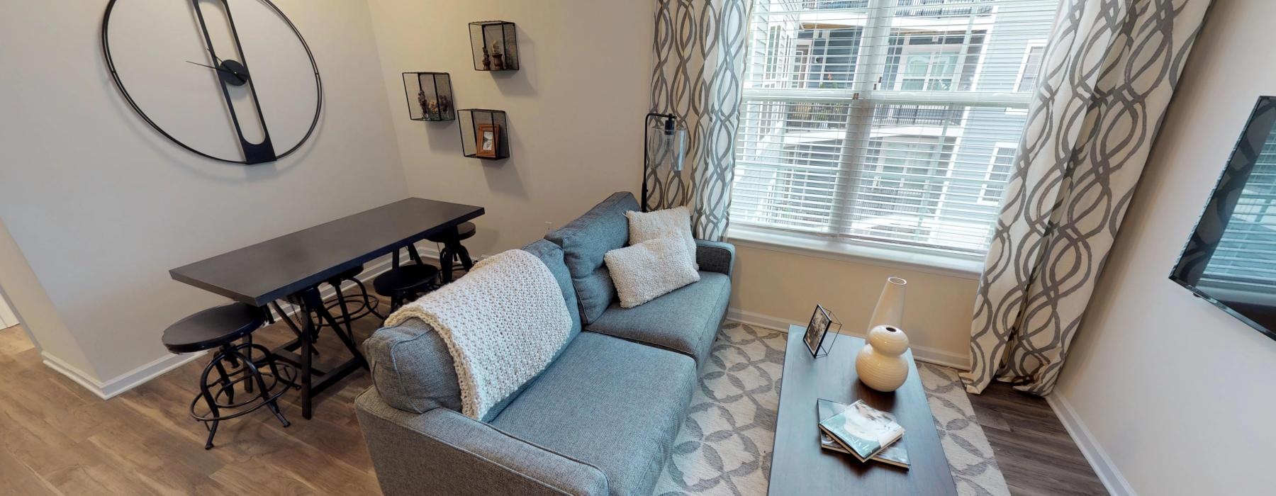 a living room with a couch and a table